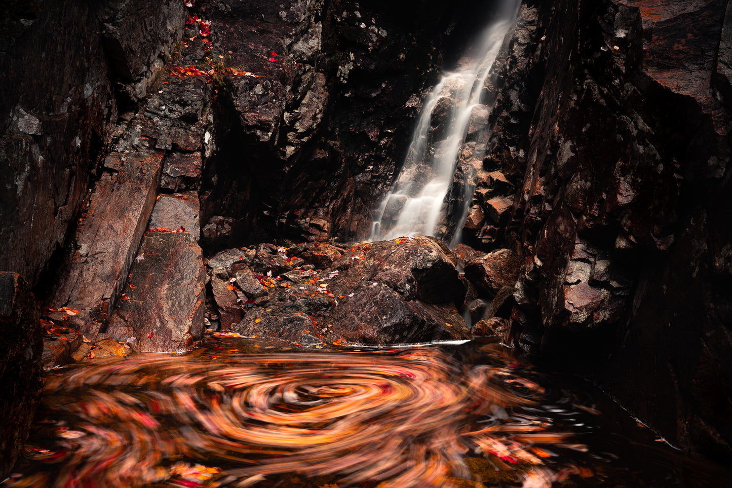 Waterfall With Swirling Leaves in the White Mountains