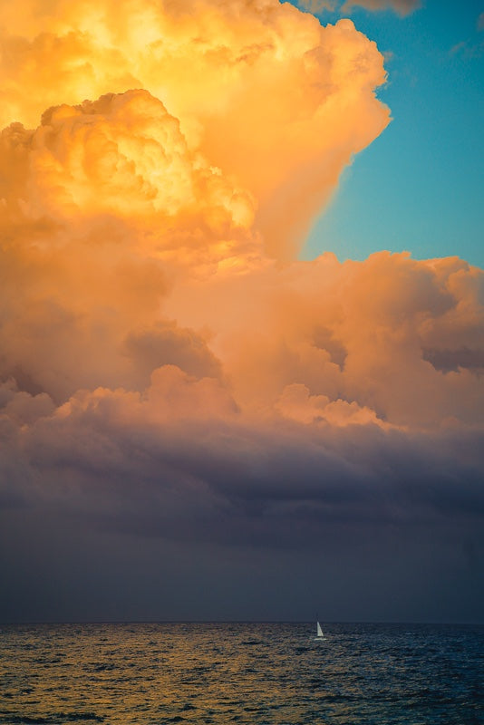 Sailboat Under Stormy Skies