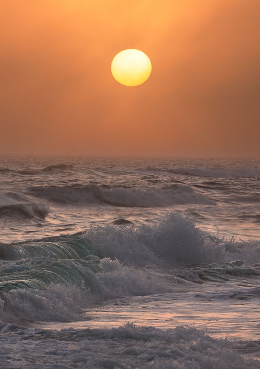 Setting Sun Through the Mist